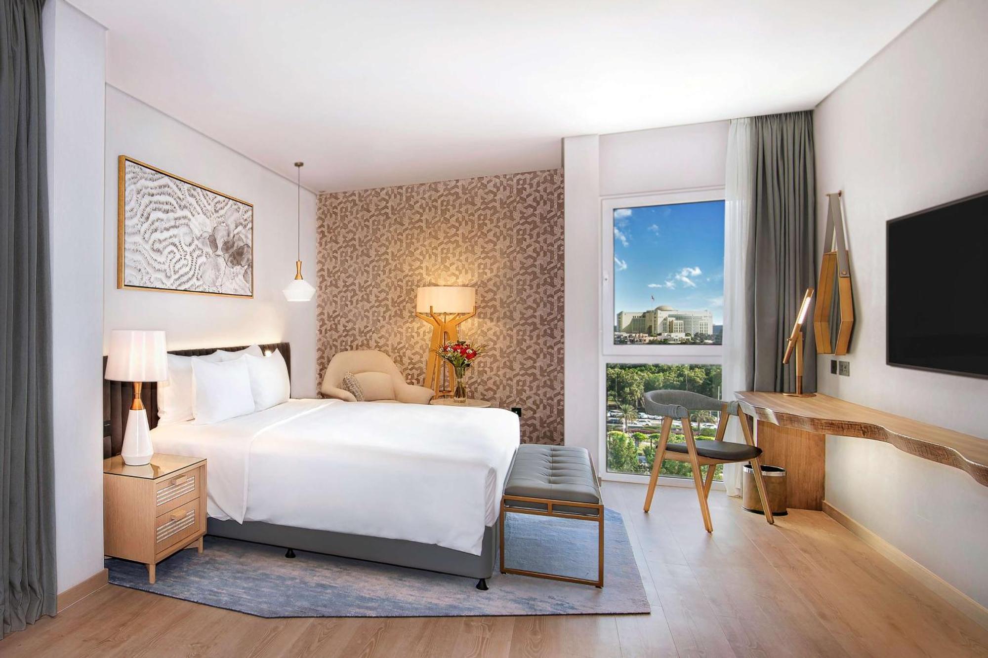 Suite Premium avec Accès au Salon et Accès Gratuit à Parc Aventure, Piscine de Surf, Piscine à Vagues et Rivière Lente - Vue sur Mer