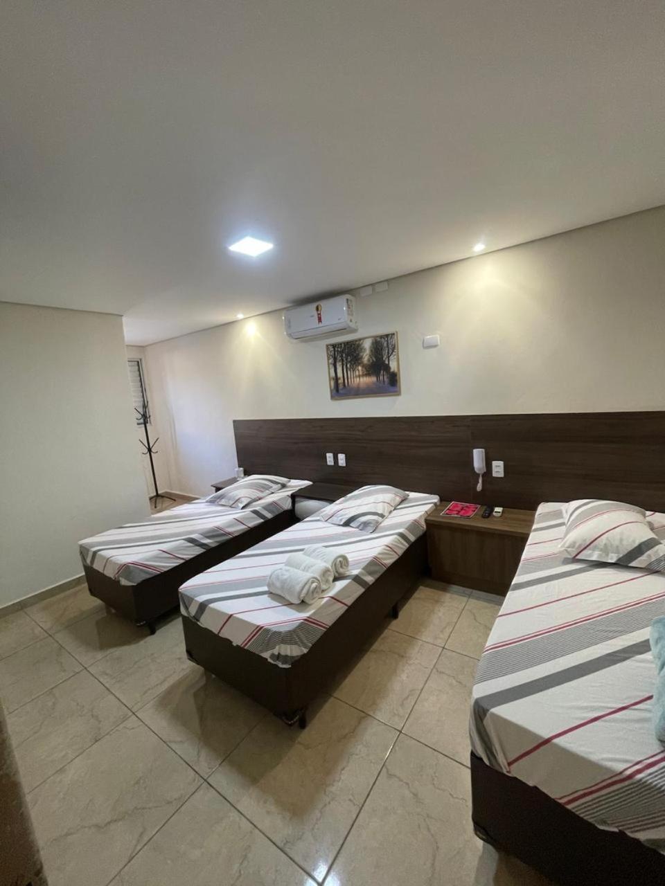 Chambre Triple avec Salle de Bains Privative