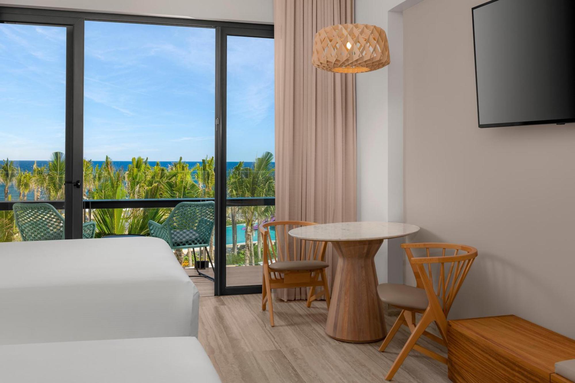 Queen Room with Two Queen Beds and Ocean View
