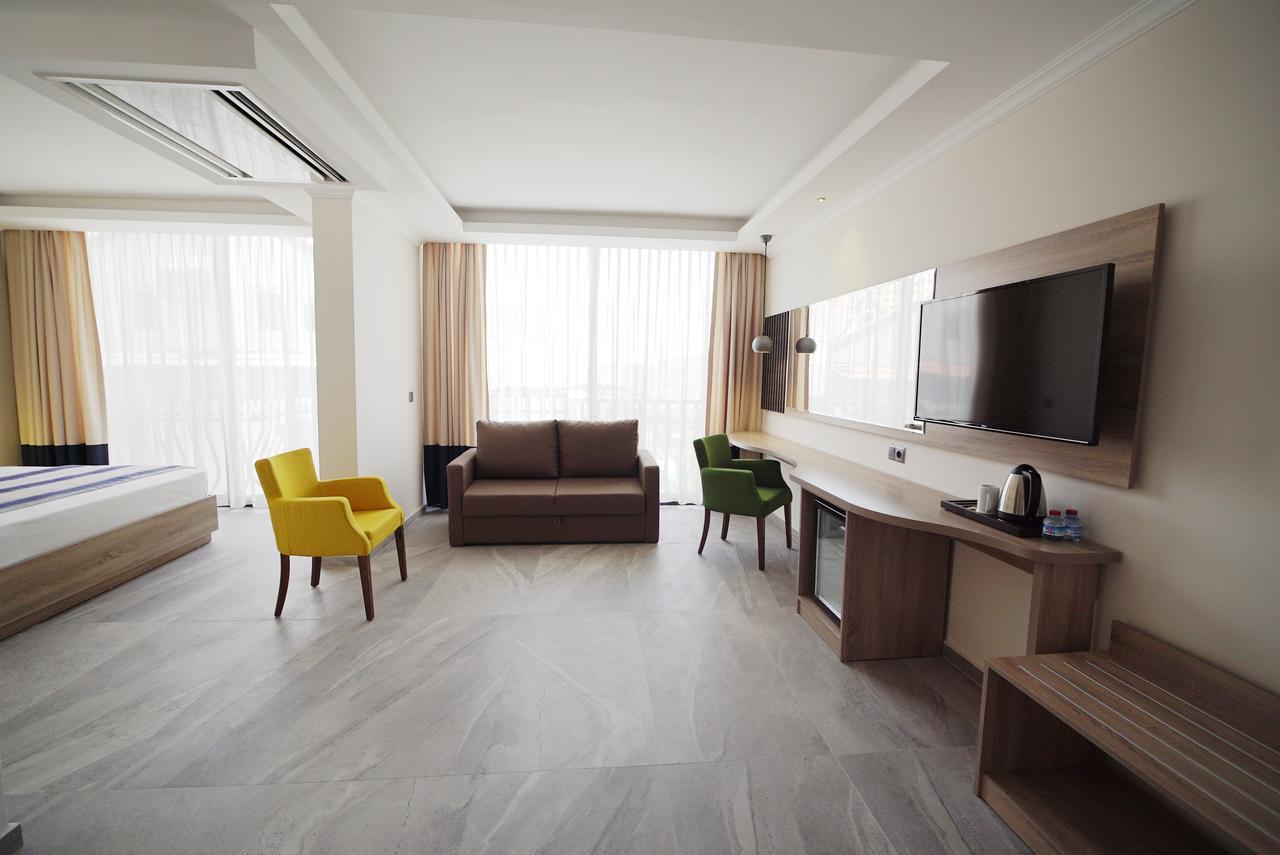 Deluxe Triple Room,665260542:JPEG