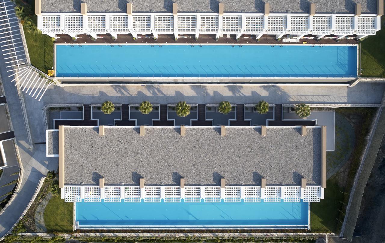 Suite Junior avec Piscine Commune et Vue sur Mer