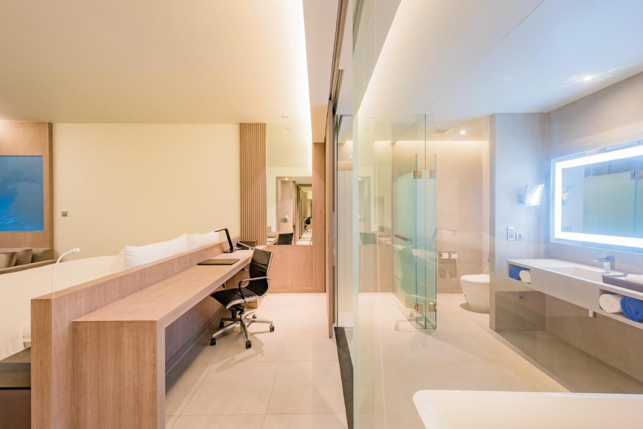 Ocean Comfy Room + One Way Airport Transfer to Hotel